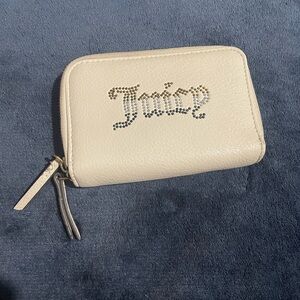 Juicy Couture cream colored wallet with orange grey and black gems
